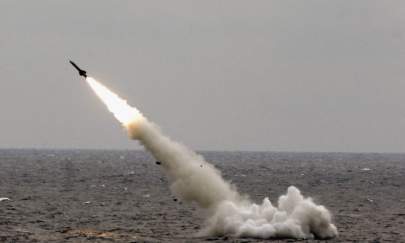 A Chinese submarine launches a missile in an offshore blockade exercise during the third phase of the Sino-Russian "Peace Mission 2005" joint military exercise, held Aug. 23, 2005 near China's Shandong Peninsula. (China Photos/Getty Images) A Chinese submarine launches a missile in an offshore blockade exercise during the third phase of the Sino-Russian "Peace Mission 2005" joint military exercise, held Aug. 23, 2005 near China's Shandong Peninsula. (China Photos/Getty Images)