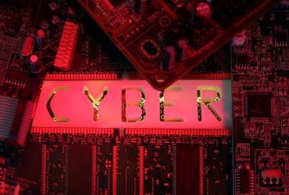 A 3D-printed Cyber word standing on PC motherboard is seen in this illustration picture, October 26, 2017. REUTERS/Dado Ruvic
