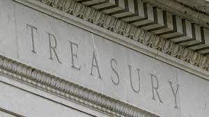 AP - FILE - This May 4, 2021 file photo shows the Treasury Building in Washington.
